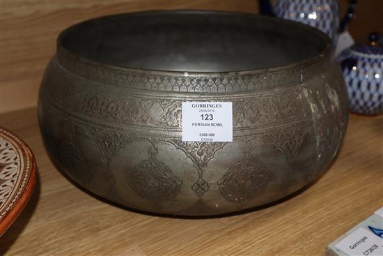 A large Persian tinned copper bowl